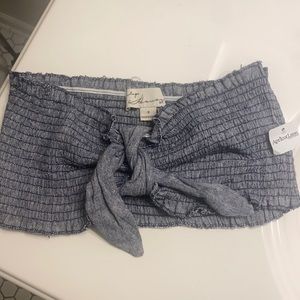 Navy Apricot Lane tube top. With bow on front (adjustable).